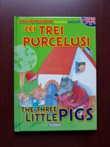 Cei trei purcelusi. The three little pigs (povesti bilingve)